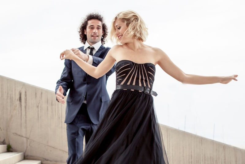Couple dancing together in the kitchen